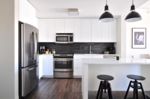 kitchen with white cupboards and an island.